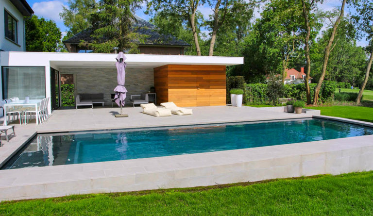 Leisure Pools Cube fiberglass pool in Silver Grey with timber pool cabana and lounge seating