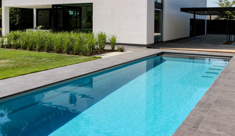 Leisure Pools Cube fiberglass pool in Silver Grey installed with modern contemporary home