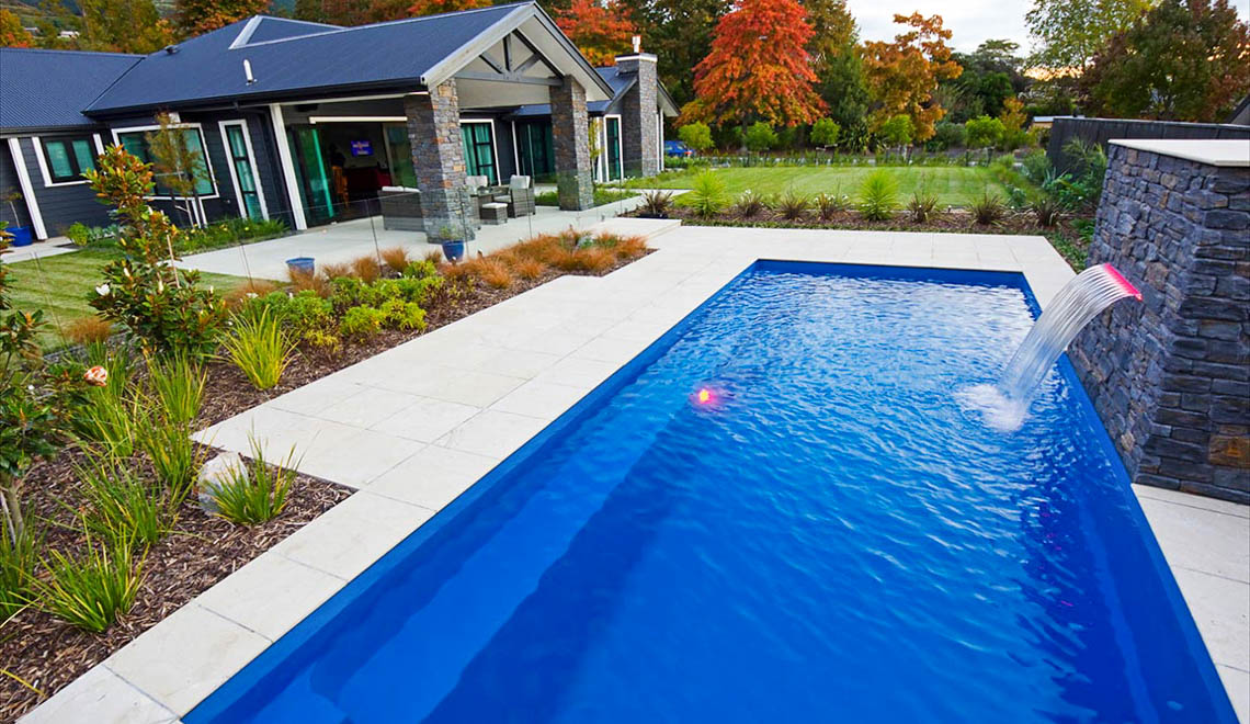 Leisure Pools Harmony fiberglass swimming pool with perimeter swimout