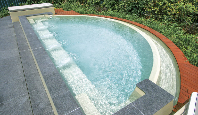 Leisure Pools Horizon fiberglass pool in Diamond Sand with timber deck surround