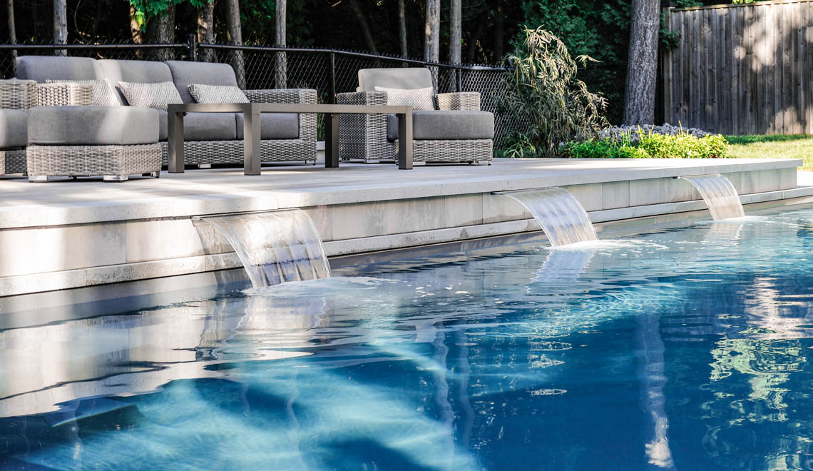 Leisure Pools Supreme composite in-ground swimming pool with deep end swimout and bench seats