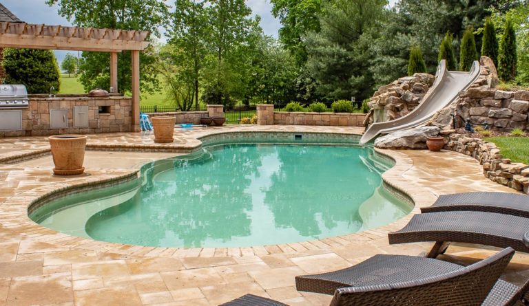 Leisure Pools Caribbean fiberglass pool in Diamond Sand with outdoor living space