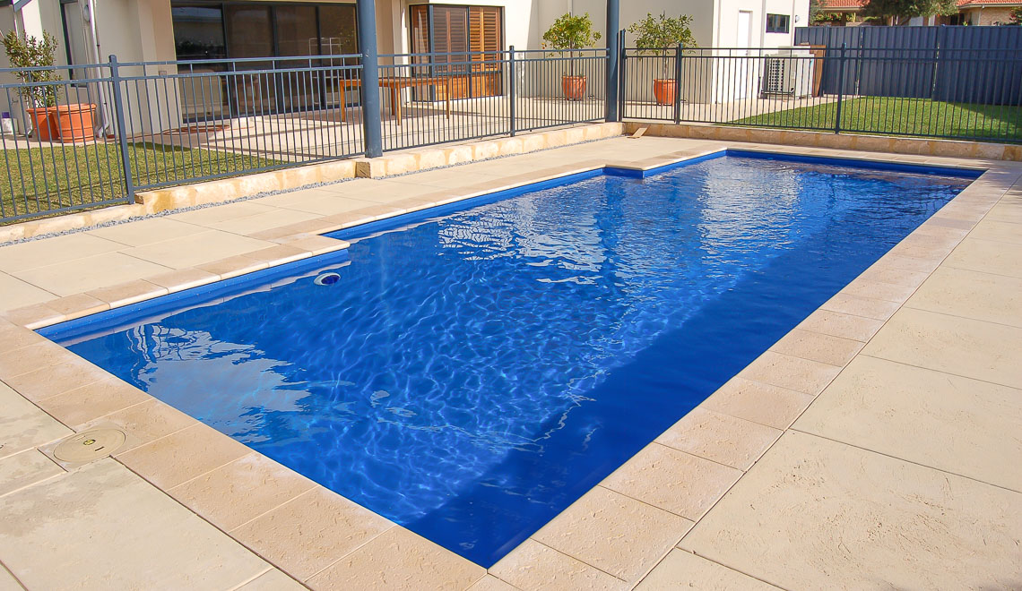 Leisure Pools Elegance fiberglass swimming pool with perimeter swimout