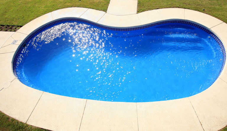 The Tuscany fiberglass pool AquaGuard X gelcoat surface close-up detail