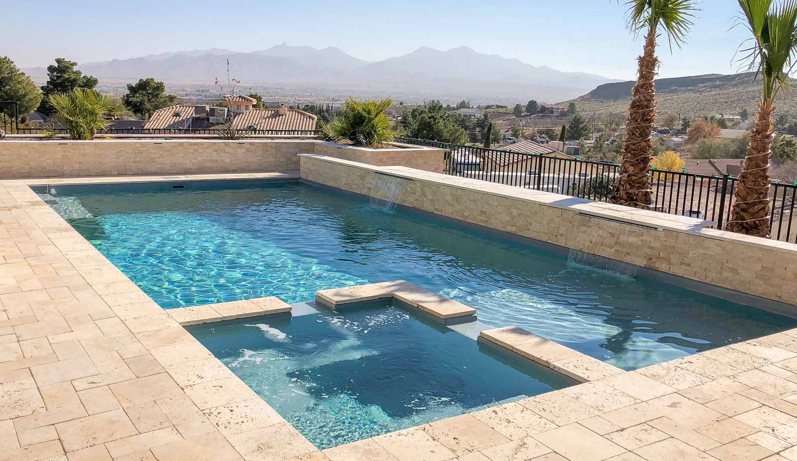 Leisure Pools Ultimate 40-foot fiberglass inground pool with built-in spa and splash deck