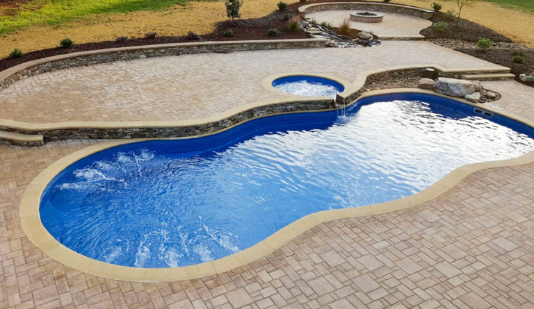The Mediterranean fiberglass pool wrap-around bench seating in Sapphire Blue