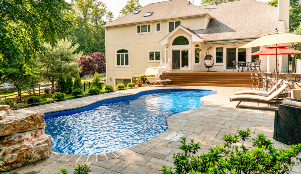 The Mediterranean fiberglass pool in Sapphire Blue aerial backyard view