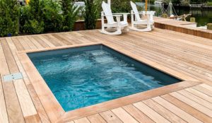 Leisure Pools Fiji Plunge fiberglass swimming pool with flat bottom