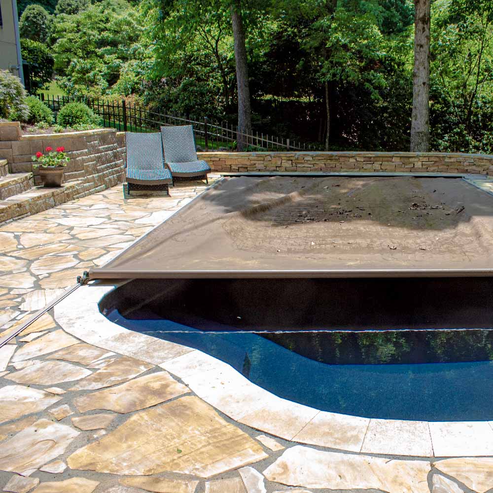 Automatic Swimming Pool Safety Covers help protect our pool from trash and debris.