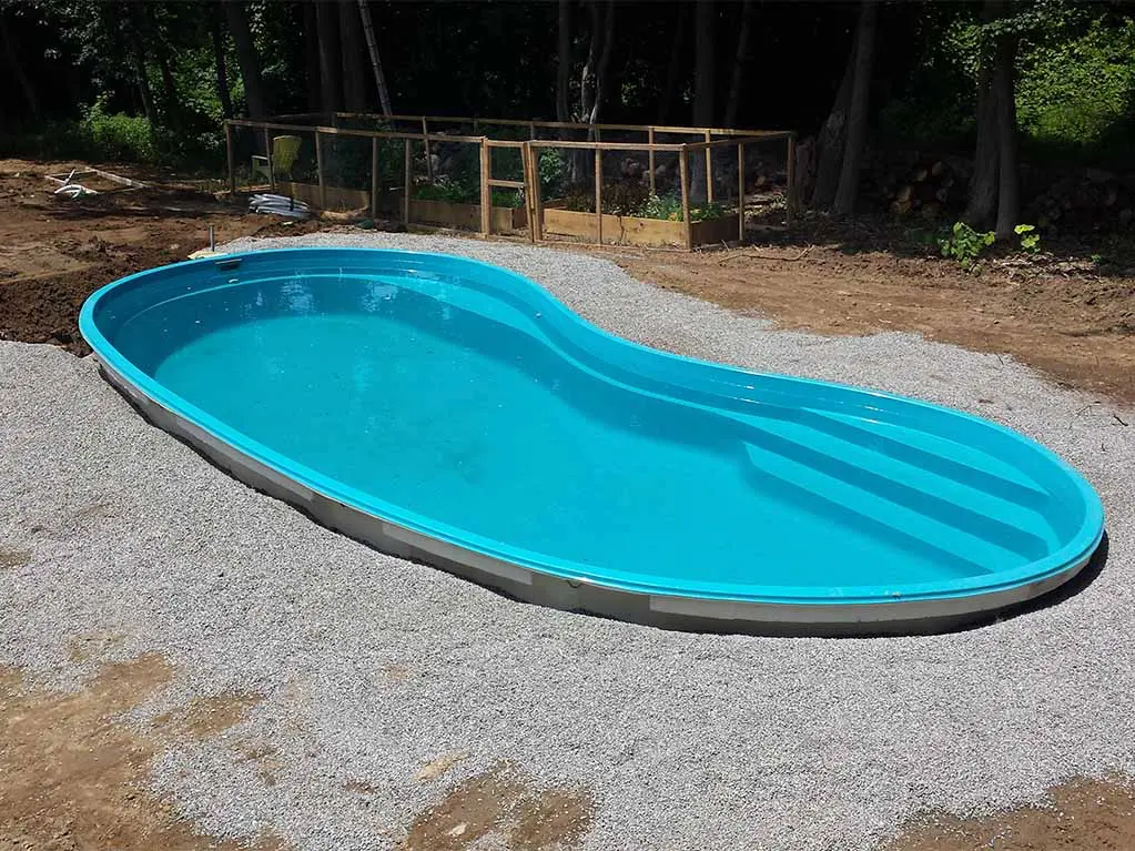 the backfilling of a composite fiberglass pool has been completed