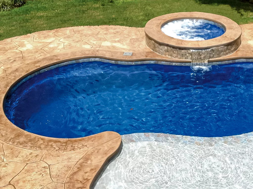 Leisure Pools Riviera fiberglass pool with added spa