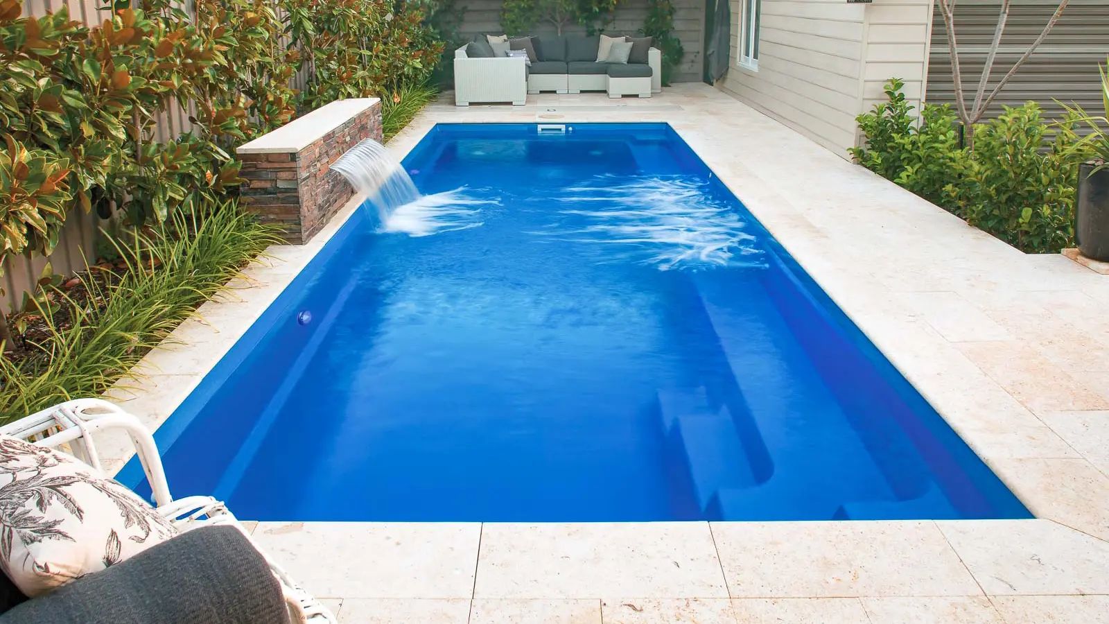 The Harmony, a fiberglass pool with a full channel swim