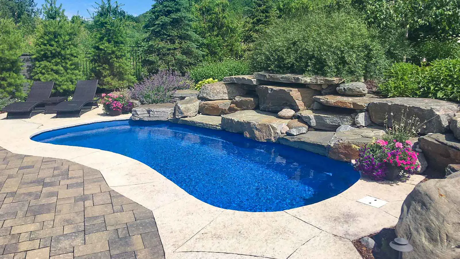 The Tuscany, a freeform fiberglass pool with carefully designed steps and curves