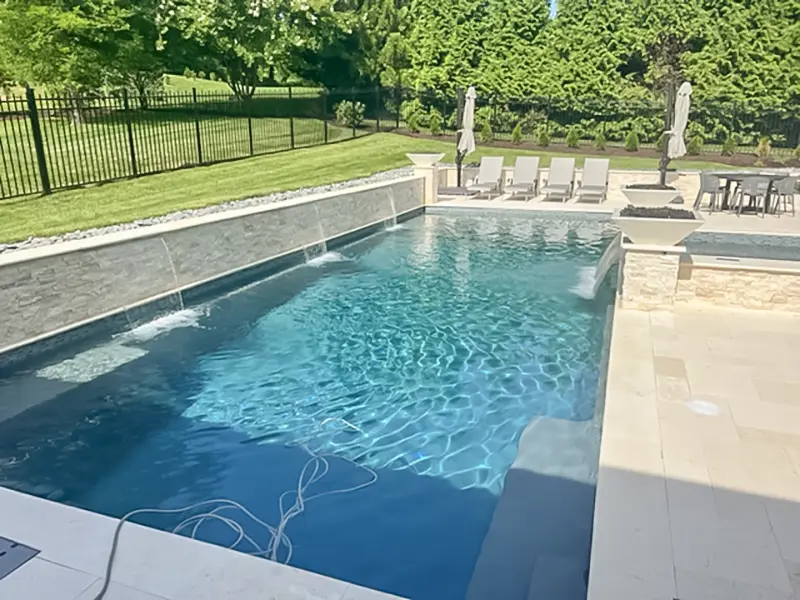Leisure Pools Pinnacle 40 fiberglass inground swimming pool with Sorrento Spa