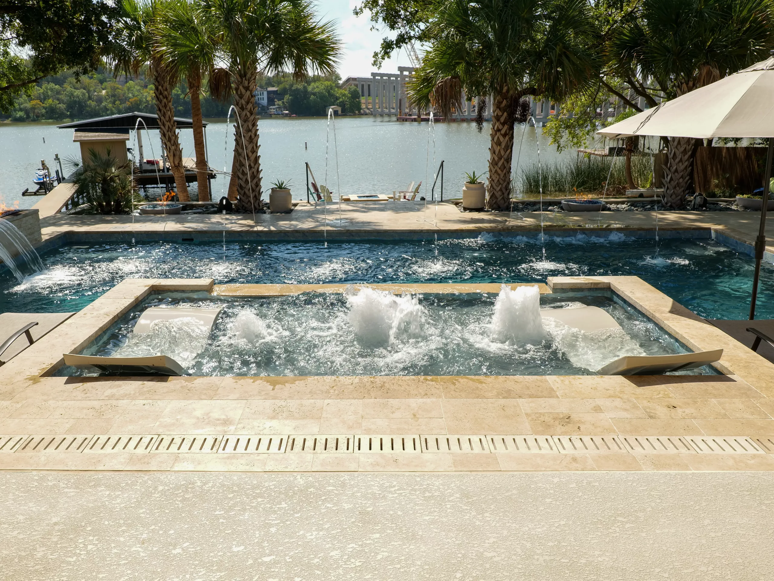 Leisure Pools Supreme 35 inground fiberglass swimming pool with tanning ledge