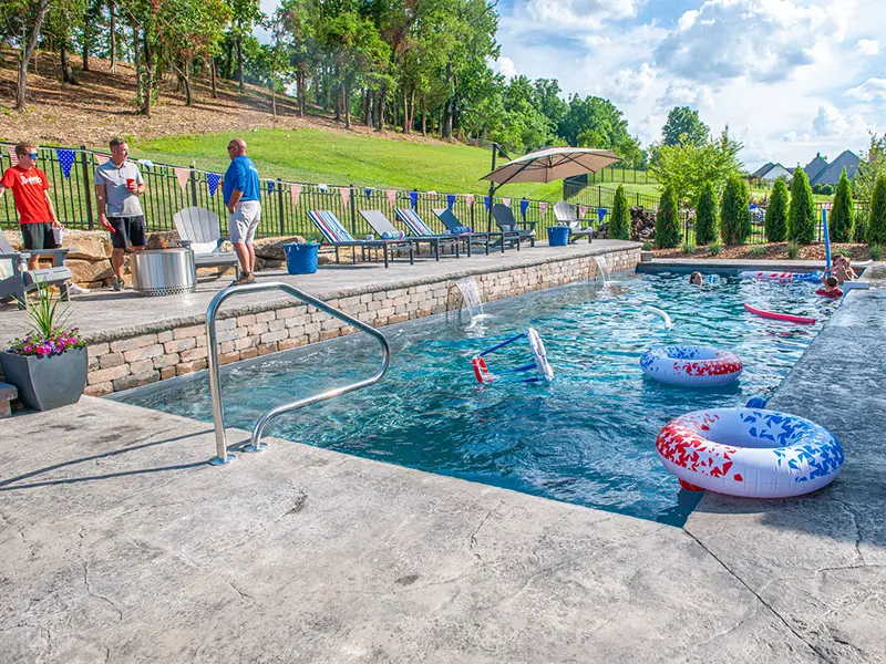 Leisure Pools Pinnacle 40 fiberglass inground swimming pool in Graphite Gray