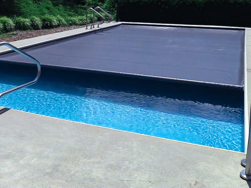 Winterize fiberglass pool with automatic pool cover