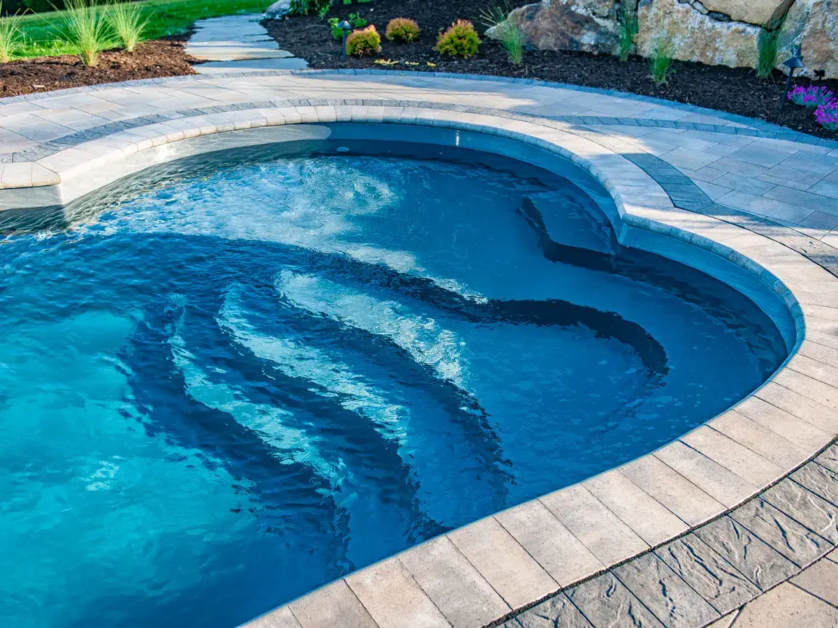A Leisure Pools fiberglass swimming pool installation in Clinton, TN