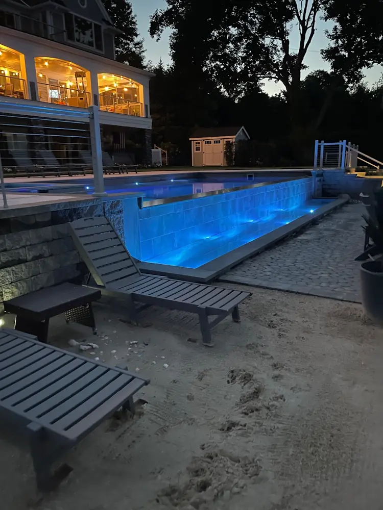 A Leisure Pools’ Fiberglass Pool Overlooks Port Jefferson Harbor