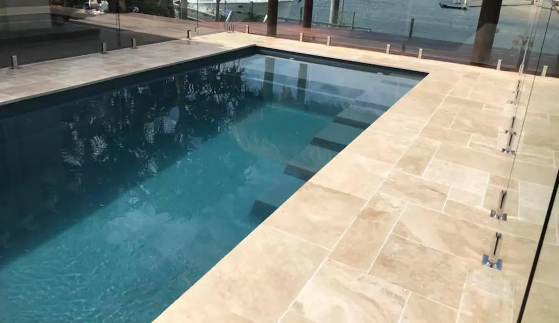 Leisure Pools Precision composite swimming pool with built-in splash deck