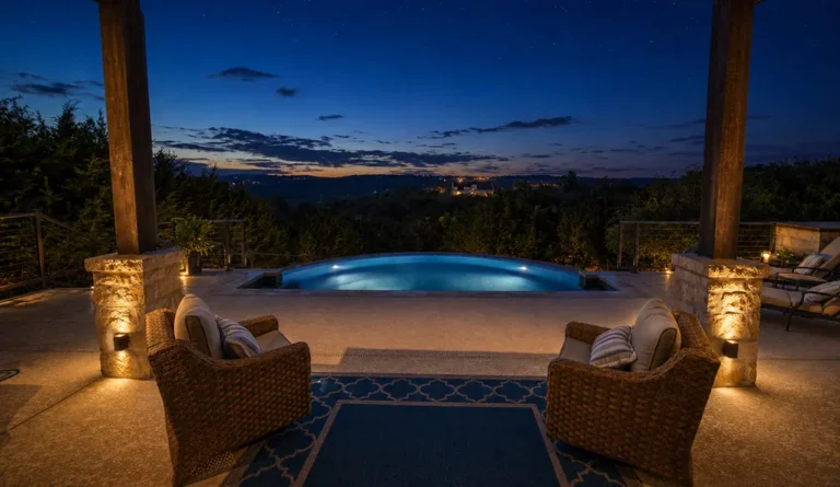 Leisure Pools Horizon model in Ebony Blue nighttime beauty shot.