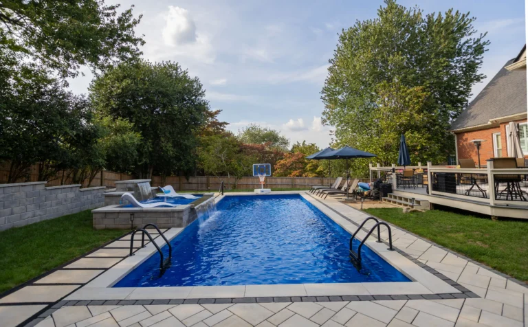 Leisure Pools 40' Infinity model in Sapphire blue straight shot.