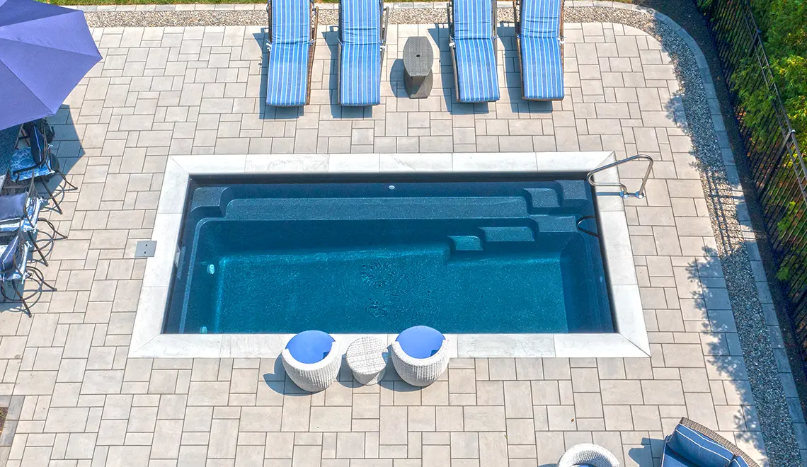 Leisure Pools 20' Harmony model in Ebony Blue full side angle shot.