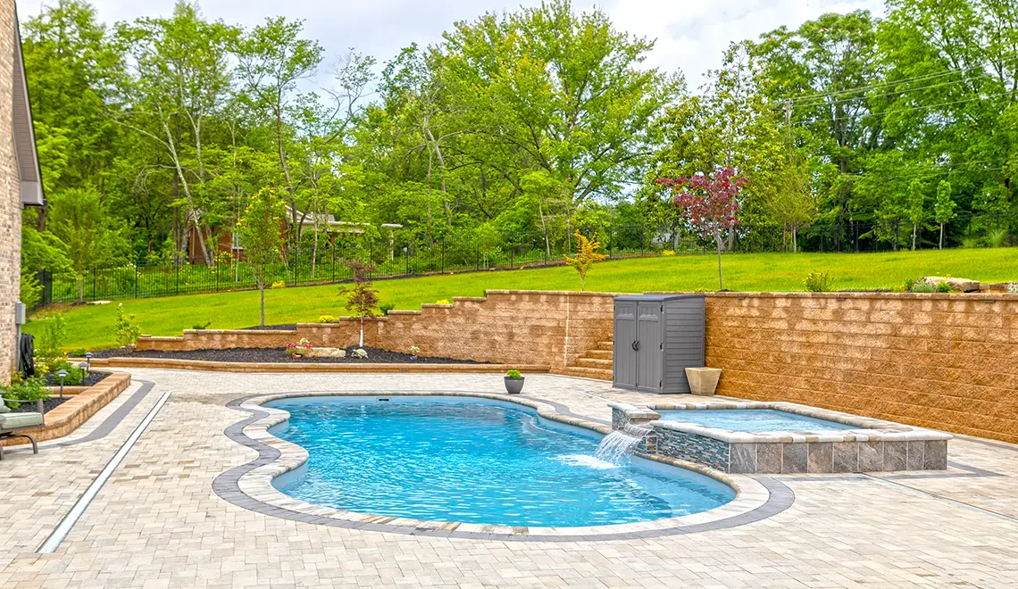Leisure Pools 40' Mediterranean in Silver Grey color with tanning ledge enhancement.