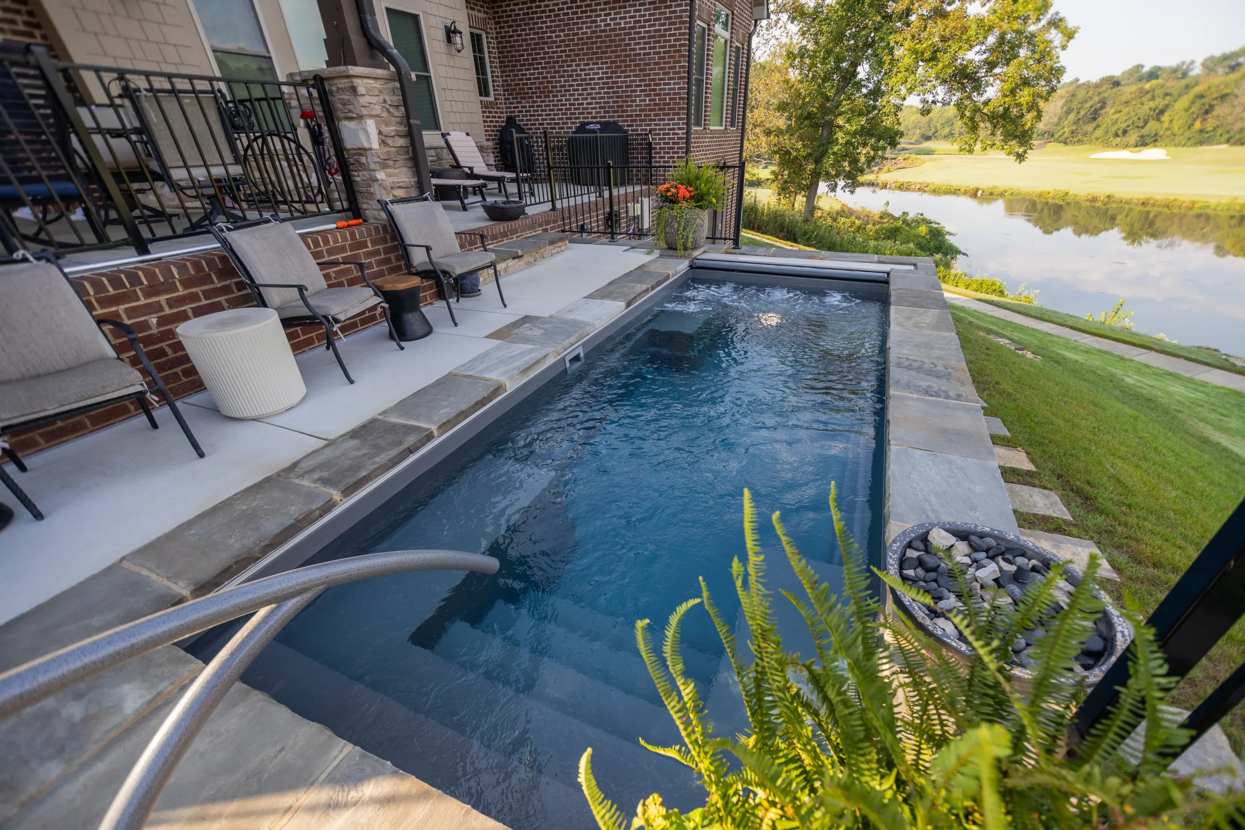 The Palladium Plunge fiberglass pool flat bottom and full pool length view