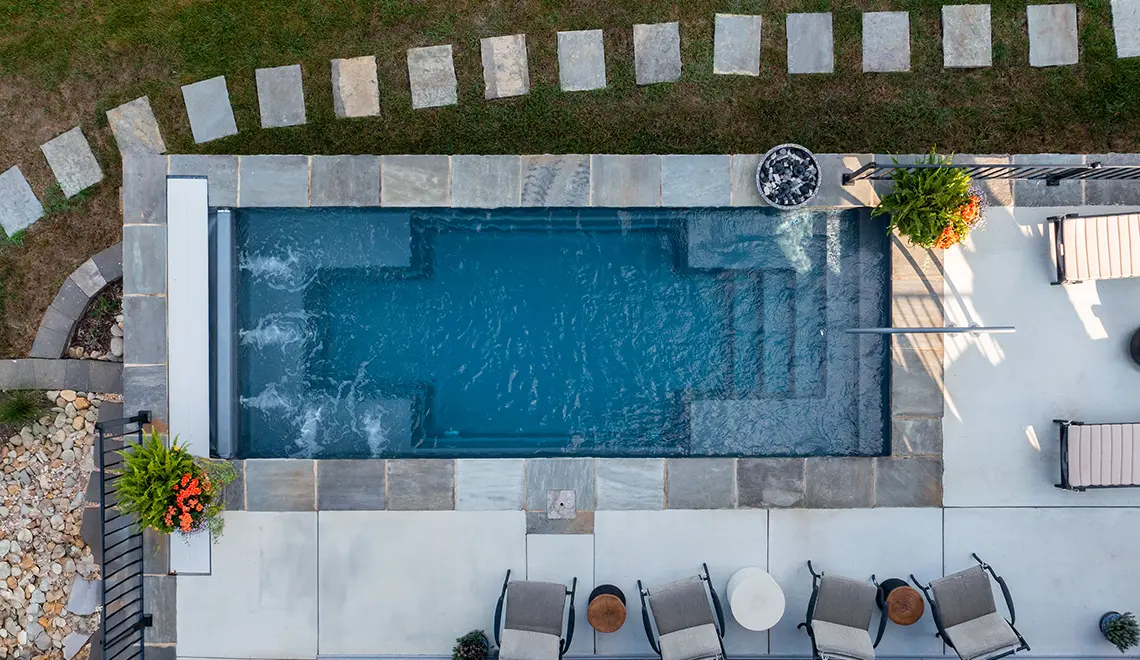 The Palladium Plunge fiberglass pool flat bottom and full pool length view