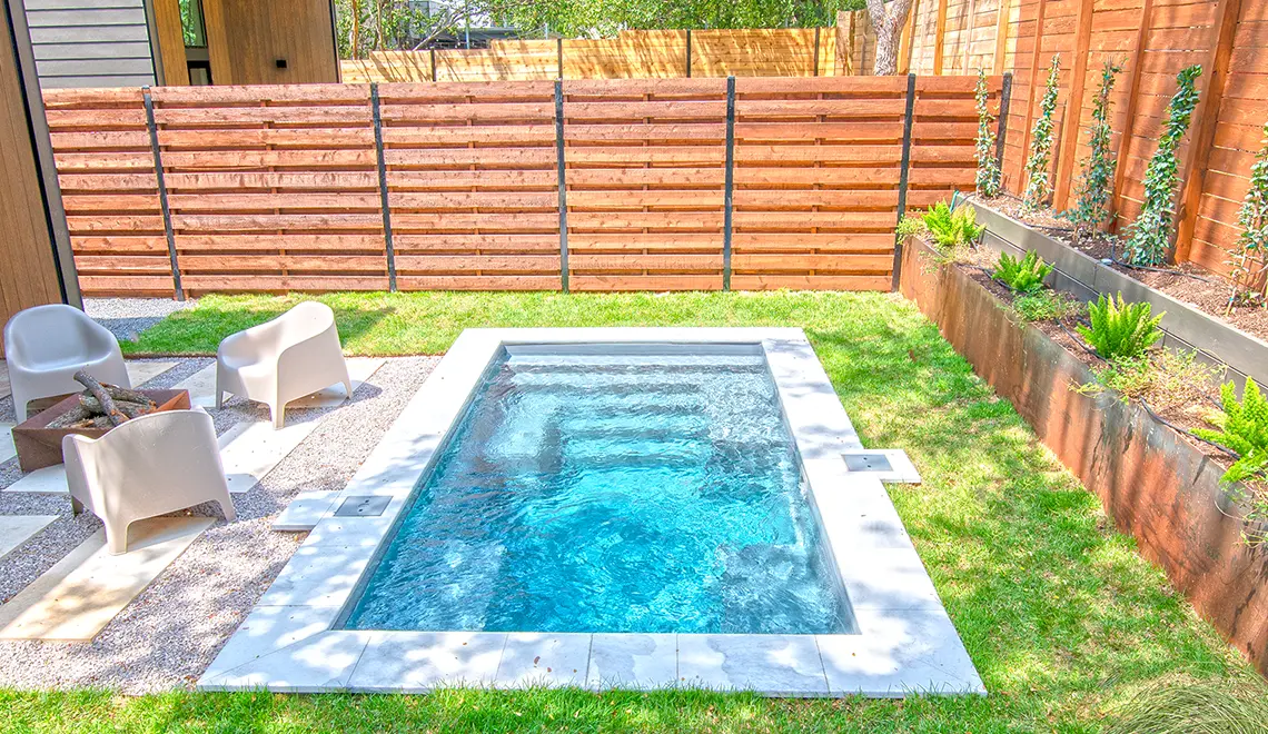 The Palladium Plunge fiberglass pool flat bottom and full pool length view