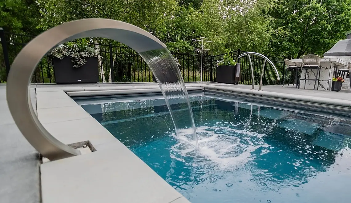 Leisure Pools Precision fiberglass flat bottom swimming pool with built-in splash deck