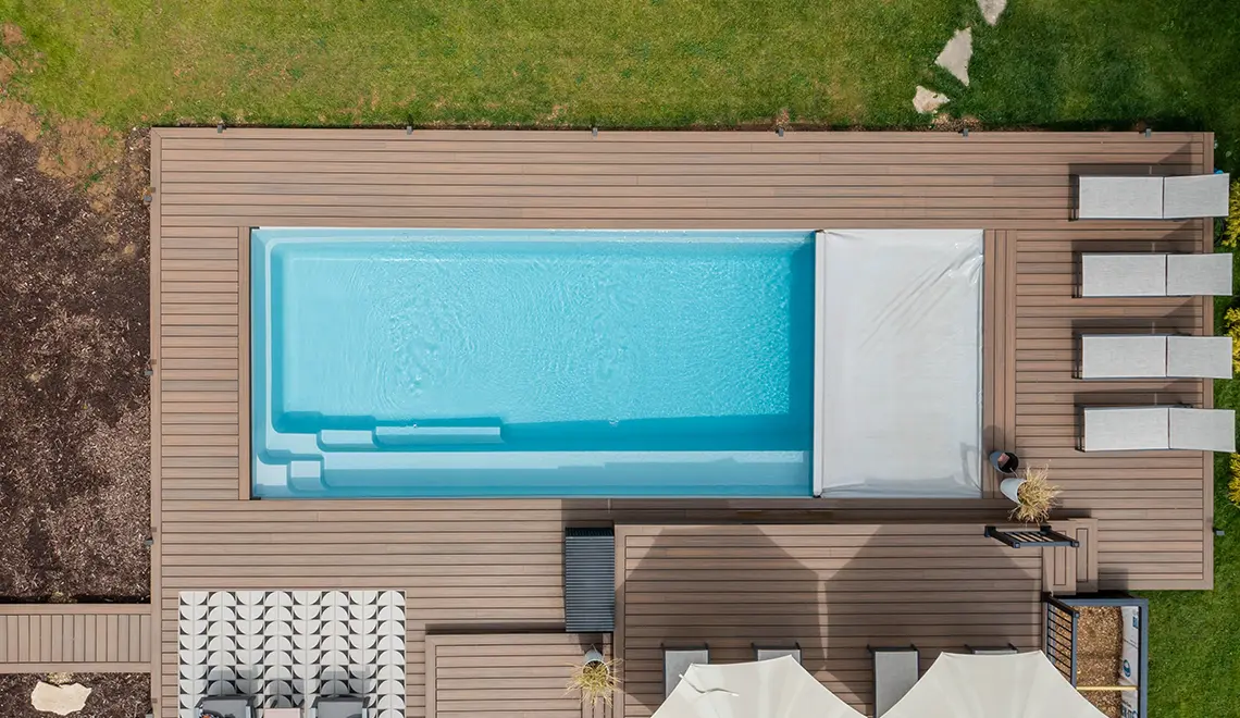 The Reflection rectangular fiberglass pool in Sapphire Blue