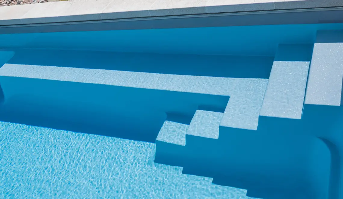 The Supreme fiberglass pool with unobstructed swim channel