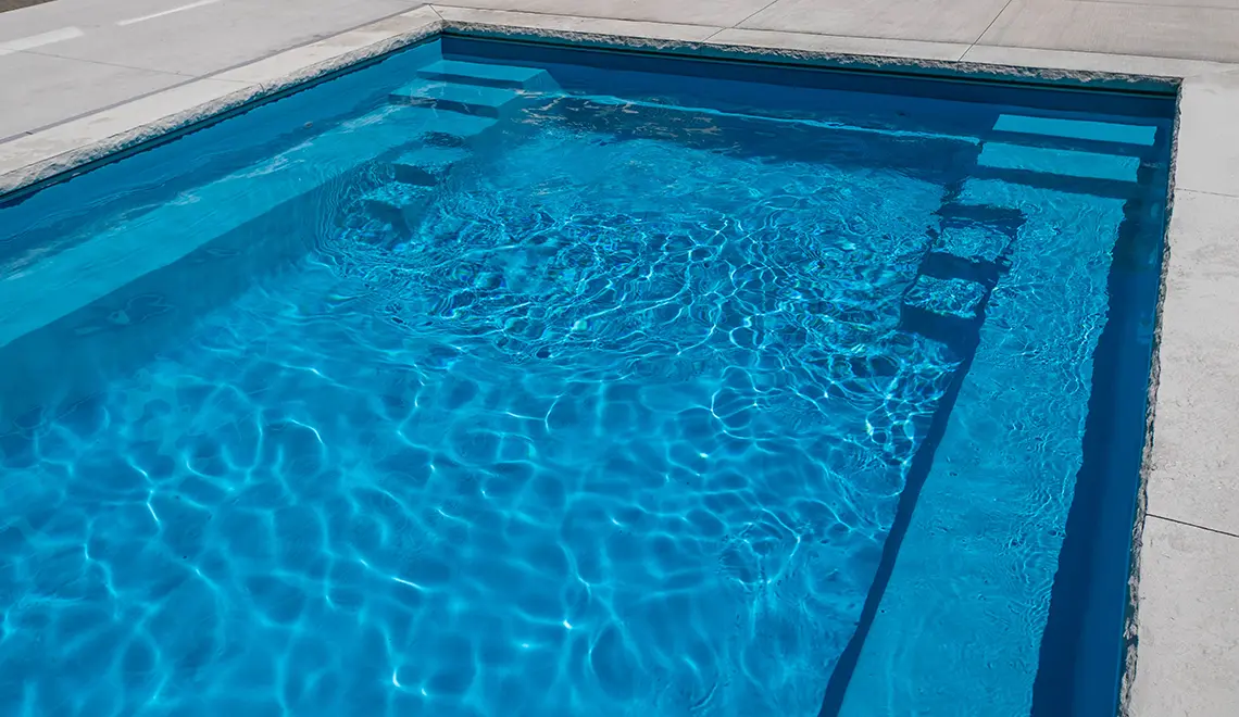 The Supreme fiberglass pool with unobstructed swim channel