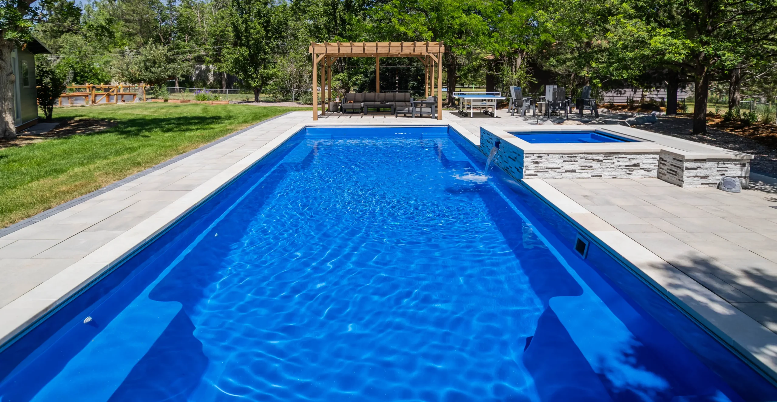 The Supreme fiberglass pool with unobstructed swim channel