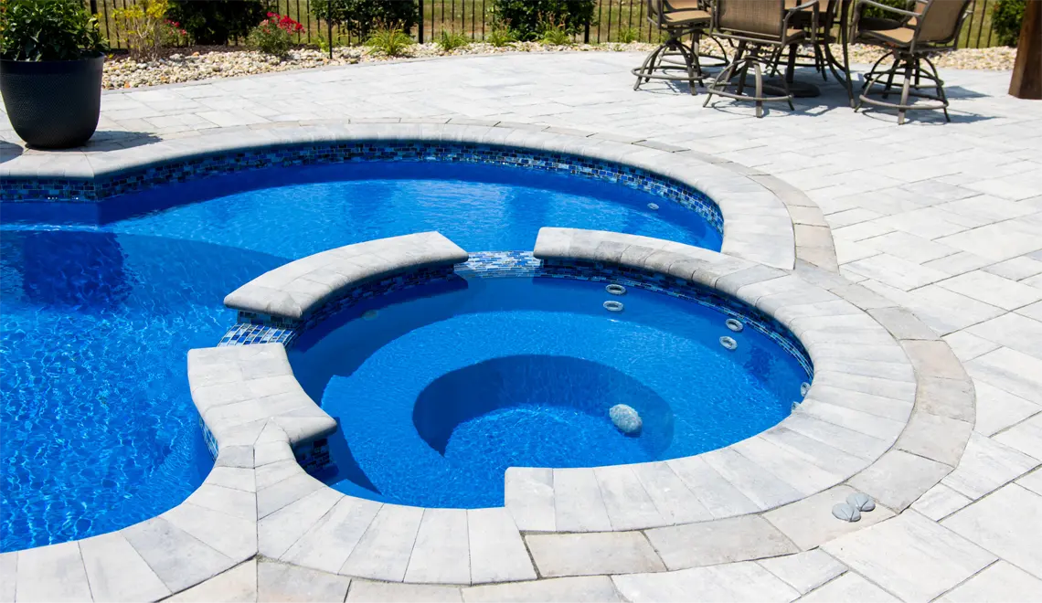Leisure Pools Eclipse Fiberglass Best Swimming Pool Freeform shape spa.