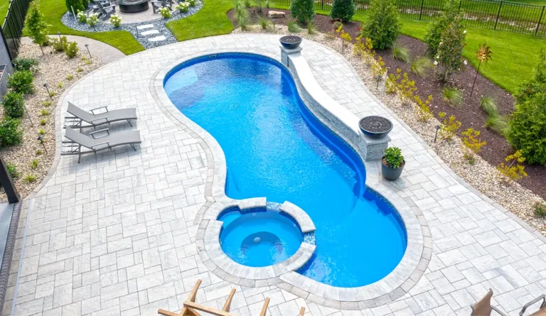 Leisure Pools Allure fiberglass pool overhead view showing spa, splash deck, and swim area