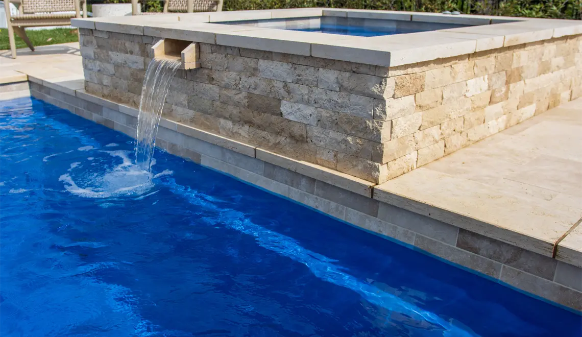 Leisure Pools Pinnacle Fiberglass Best Swimming Pool fountain spa rectangular shape.