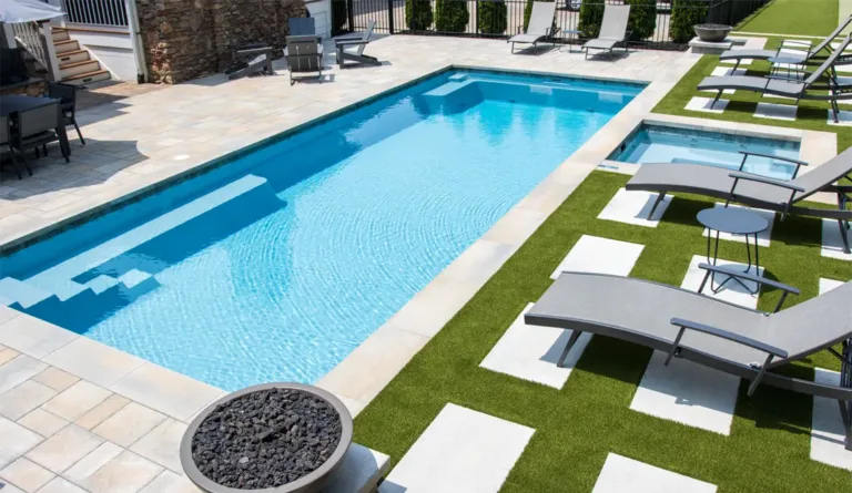 Leisure Pools Supreme fiberglass pool overhead view showing four corner entry steps