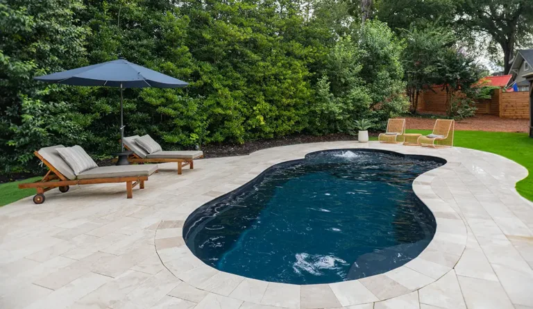 The Eclipse freeform fiberglass pool aerial view in Ebony Blue with sleek curved design