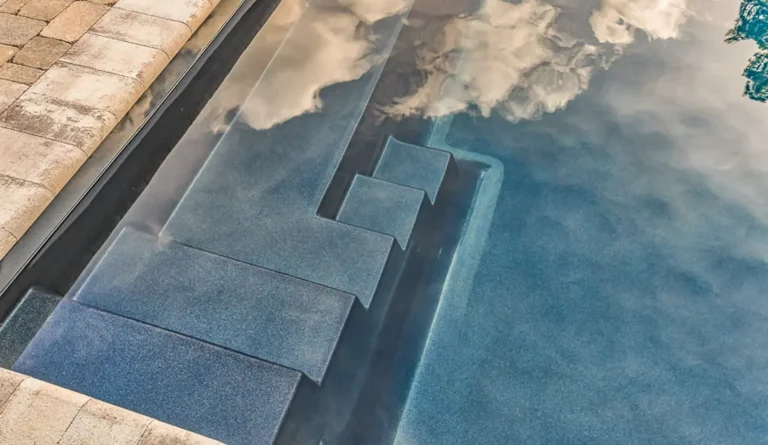 The Infinity 40 rectangular fiberglass pool bench seating and plunging deep end