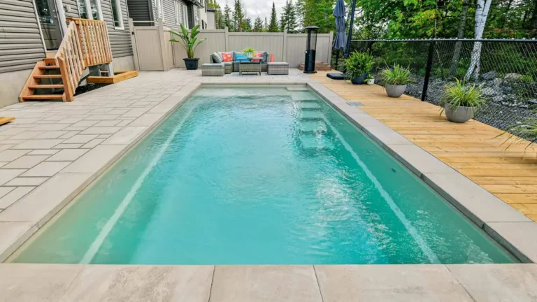 Leisure Pools Precision fiberglass pool generous entry steps and long swim channel detail