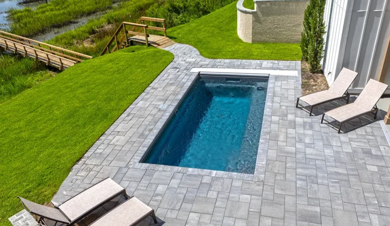 The Harmony fiberglass pool entry and exit steps overhead detail in Graphite Grey
