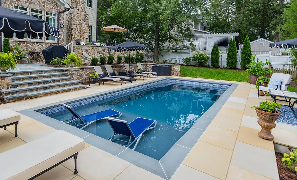 Leisure Pools Summit Rectangle Fiberglass Swimming Pool shallow end