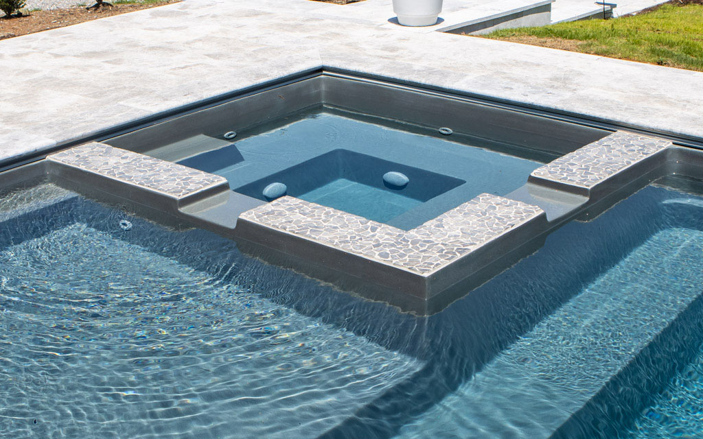 071223-MolesUltimate30GG-20 A beautiful pool with built-in spa, installed by Leisure Pools Fort Wayne