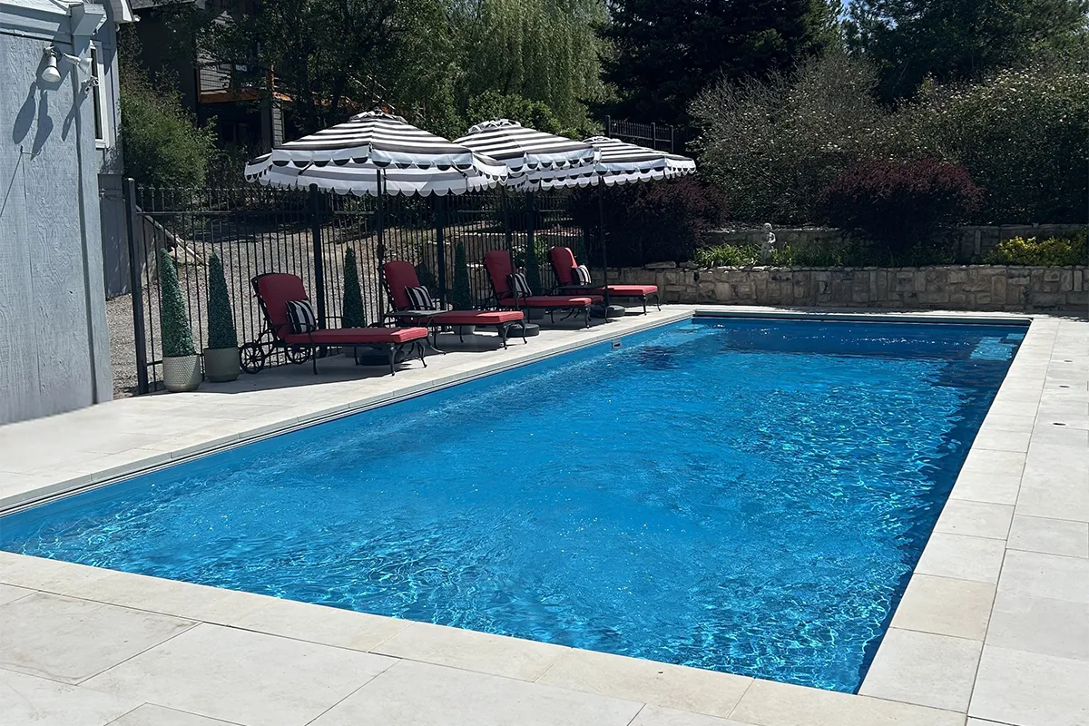 2026-05-13_littleton_kinsella_customerclose_15 The Leisure Pools Pinnacle 40 fiberglass inground swimming pool installed by Leisure Pools Denver