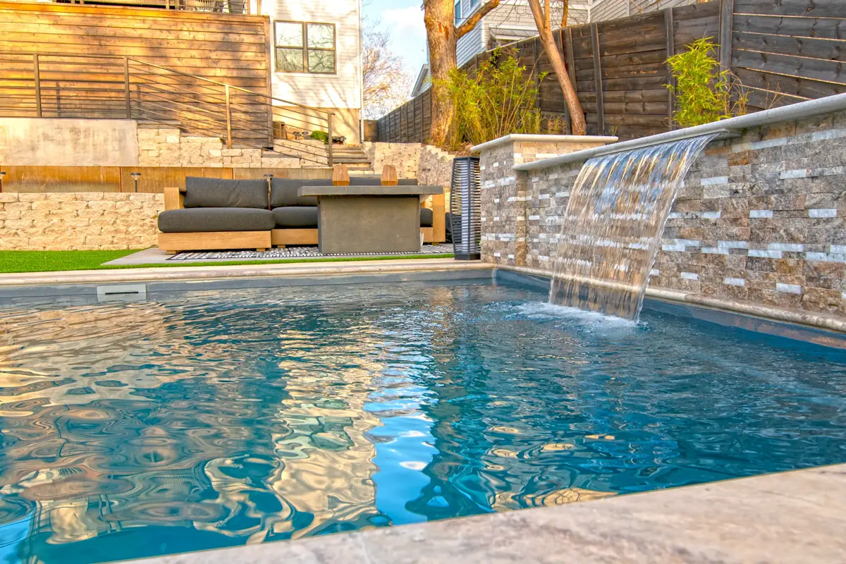 Limitless_26_GG_WaterFl A beautiful pool with water feature, installed by Leisure Pools Lake City