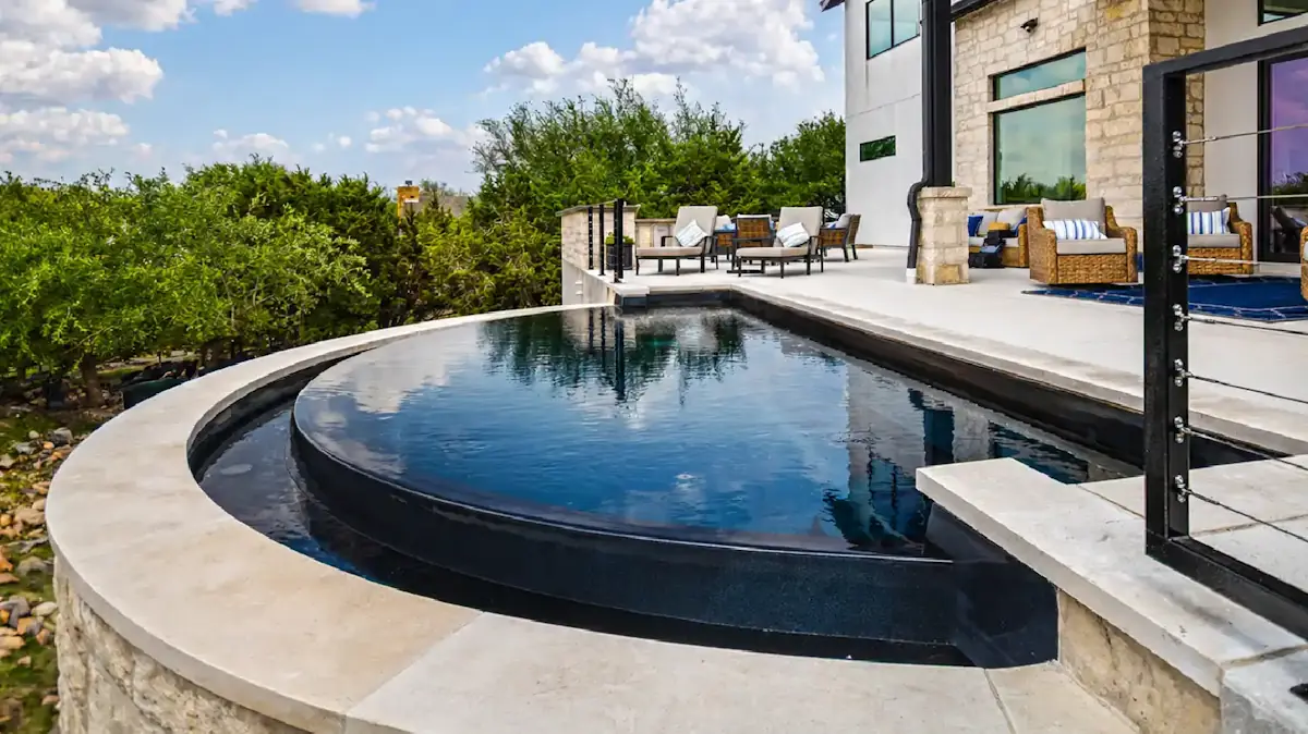 Apr2026POTM-2Supporting The Horizon backyard pool in Ebony Blue color