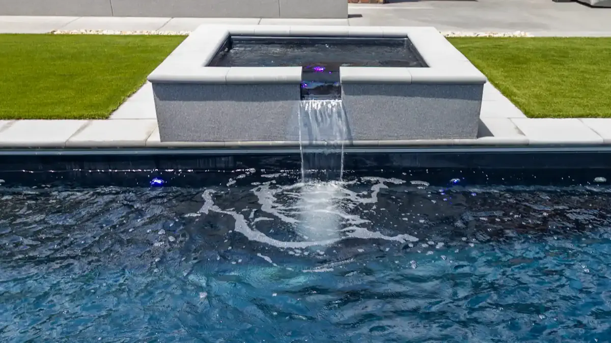 May2026POTM-3Supporting The Pinnacle 40 backyard pool with a matching Amalfi Spa